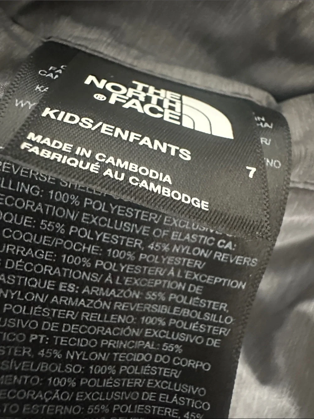 The North Face Boys Gray Reversible Mount Chimbo Jacket in Gray Size 7